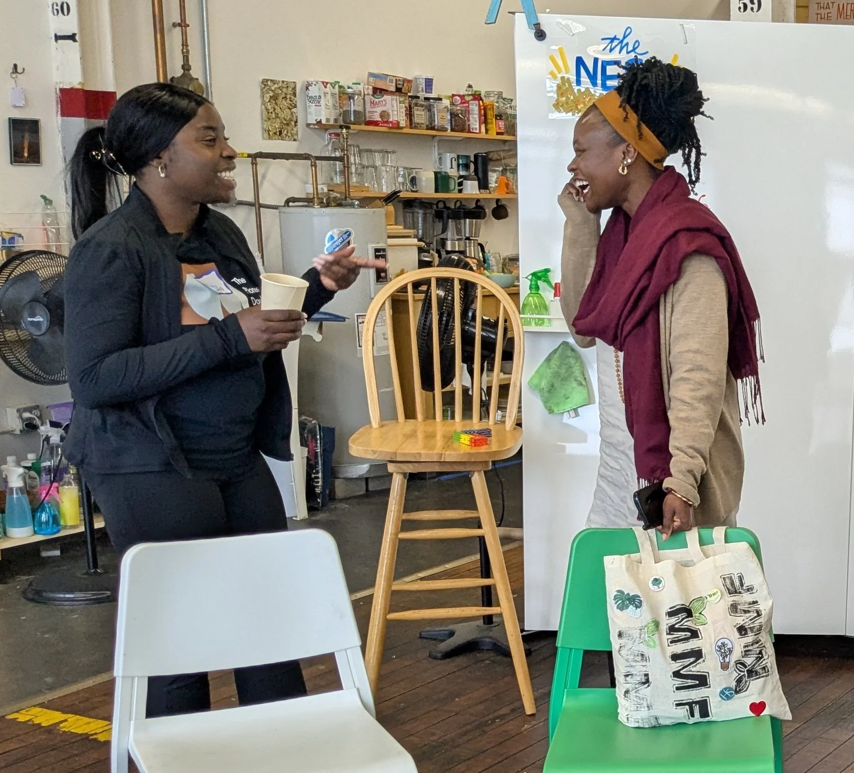 Doulas chatting at a community gathering