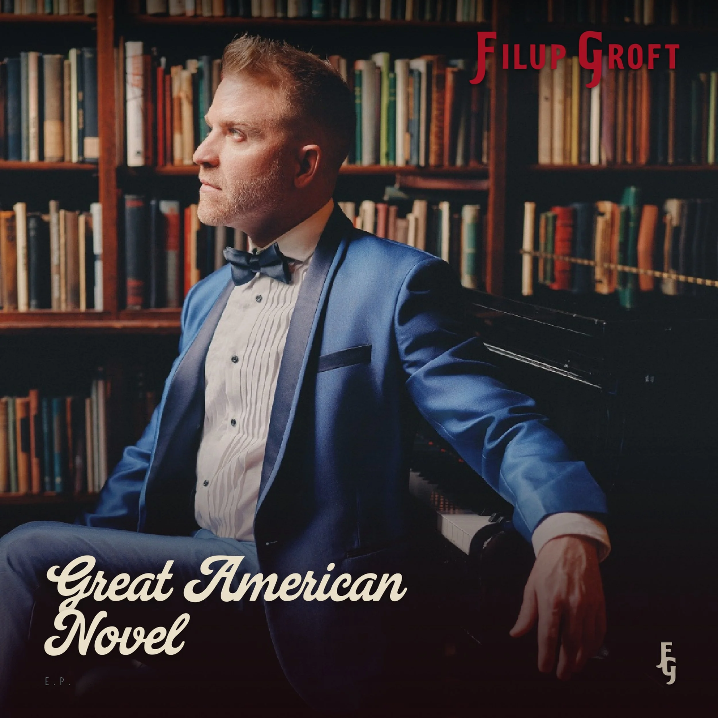 Close-up of a man's profile with red hair, wearing a blue tuxedo with a bow tie, in front of a bookshelf filled with books, on the cover of the book titled 'Great American Novel'.