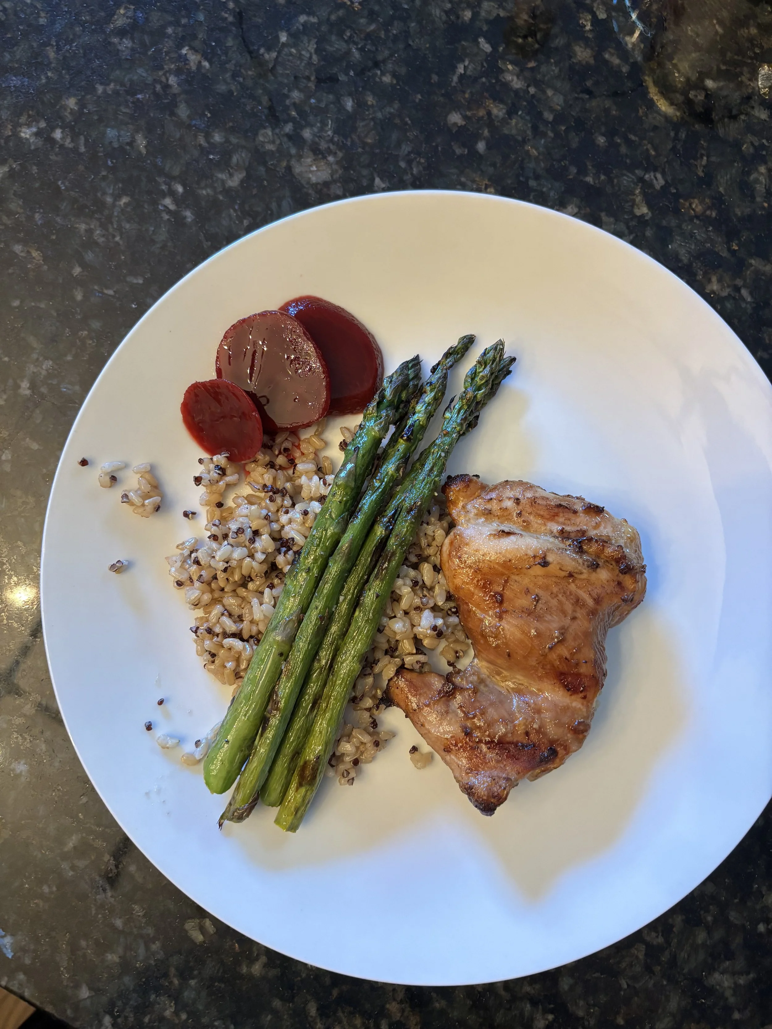 Grilled chicken thighs seasoned in an umami marinade