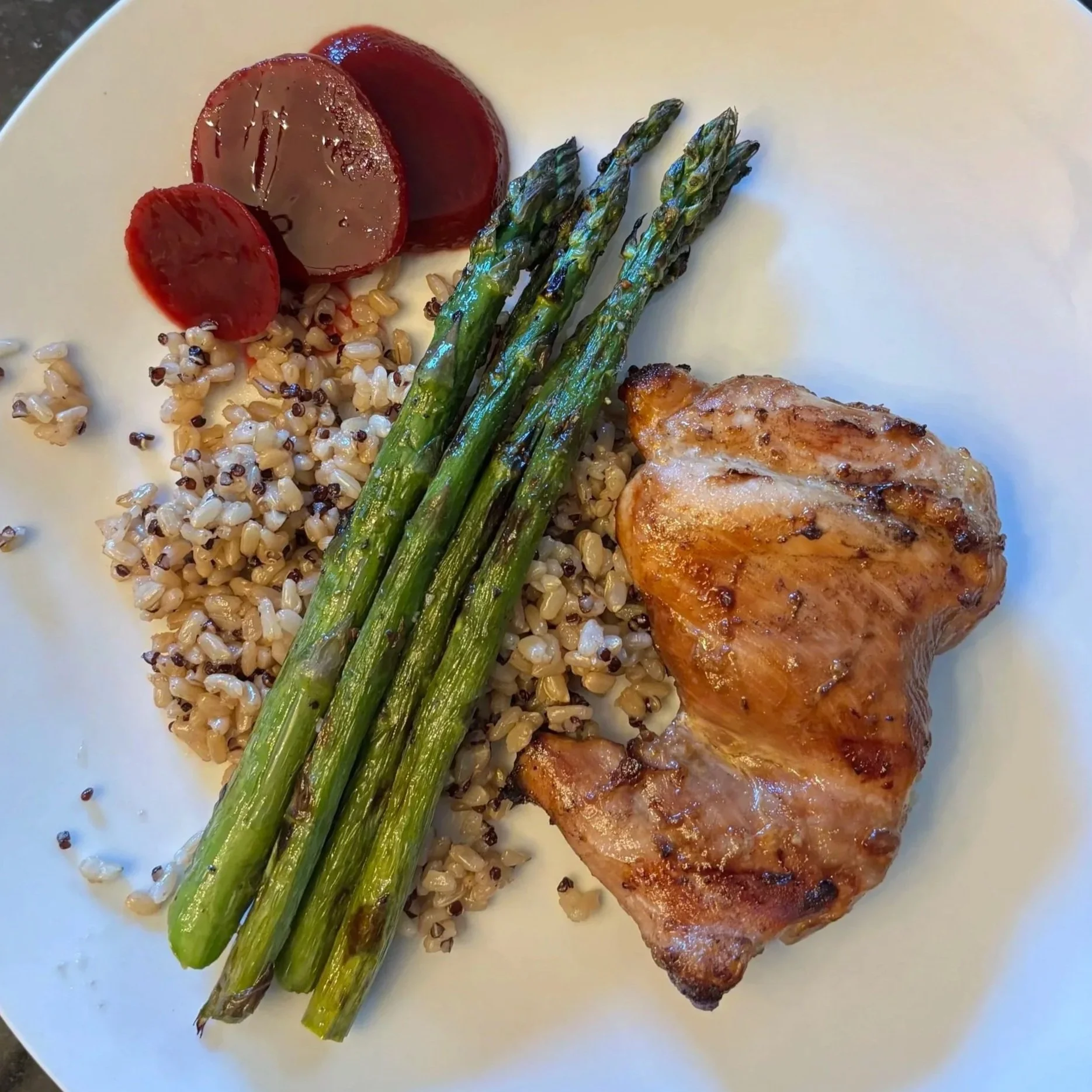 Grilled chicken thighs seasoned in an umami marinade