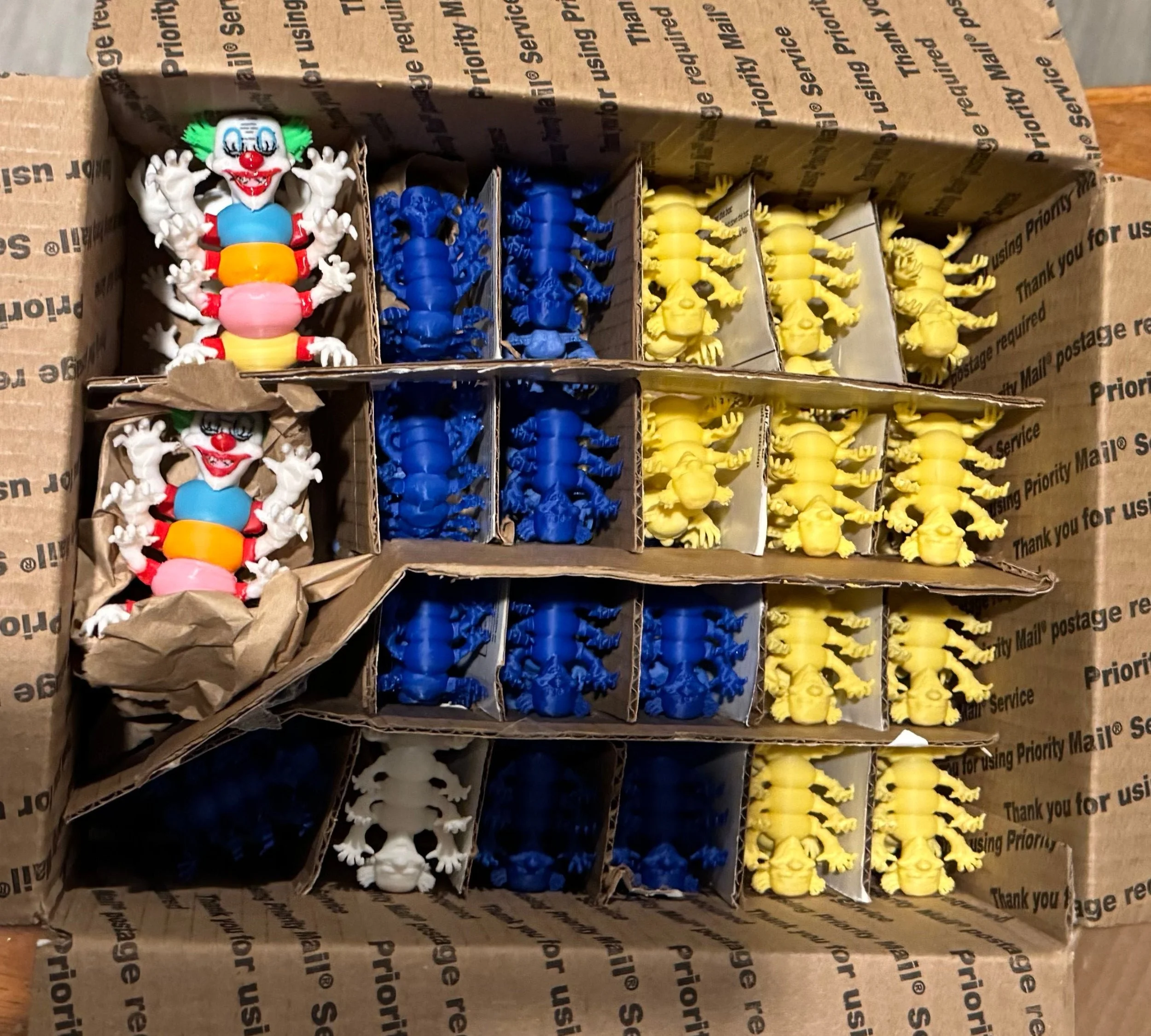 Final clowns, including full color, blue, yellow, and the white prototypes