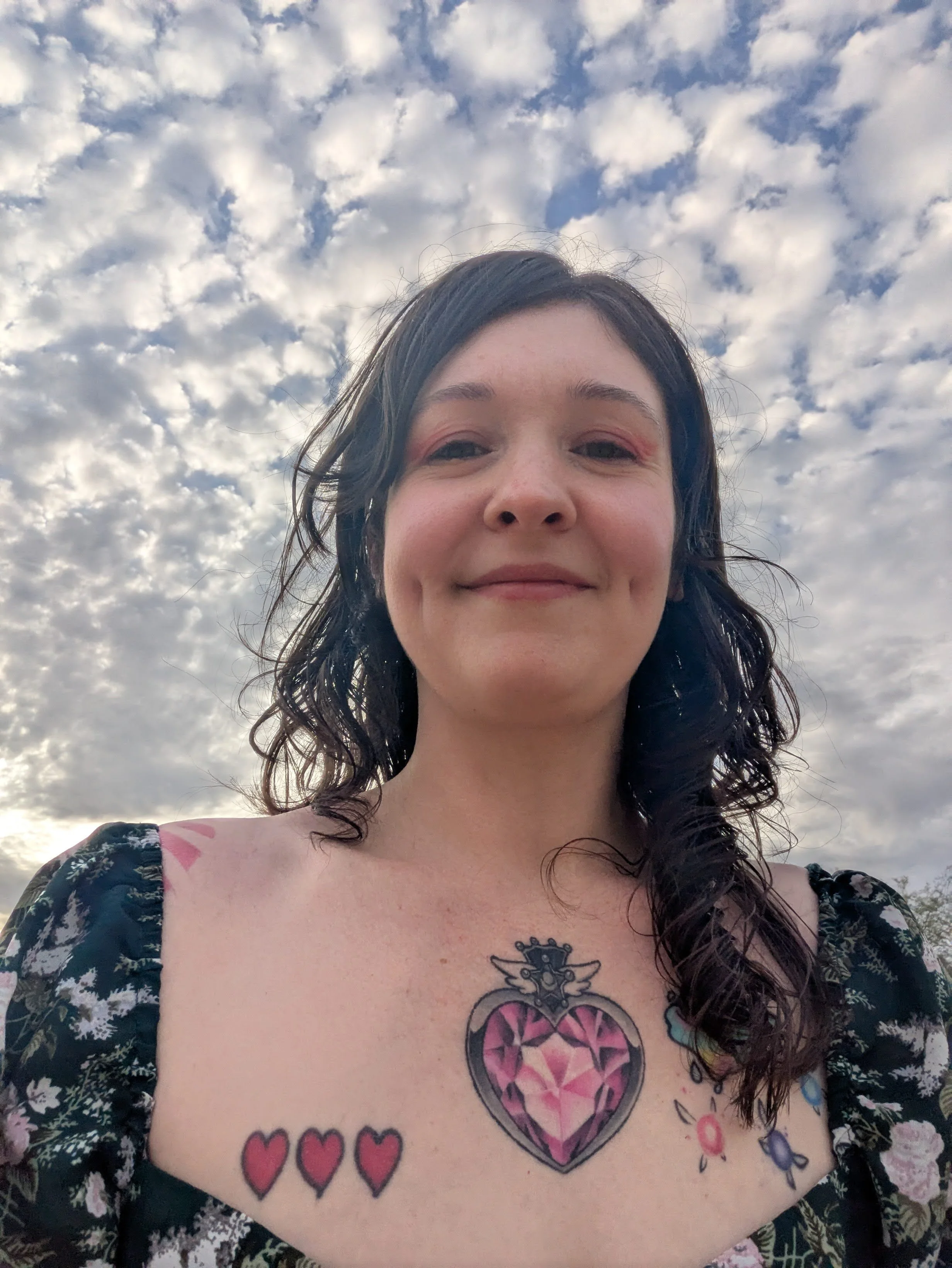 picture of Katerina Dicker with blue skies and clouds in the background
