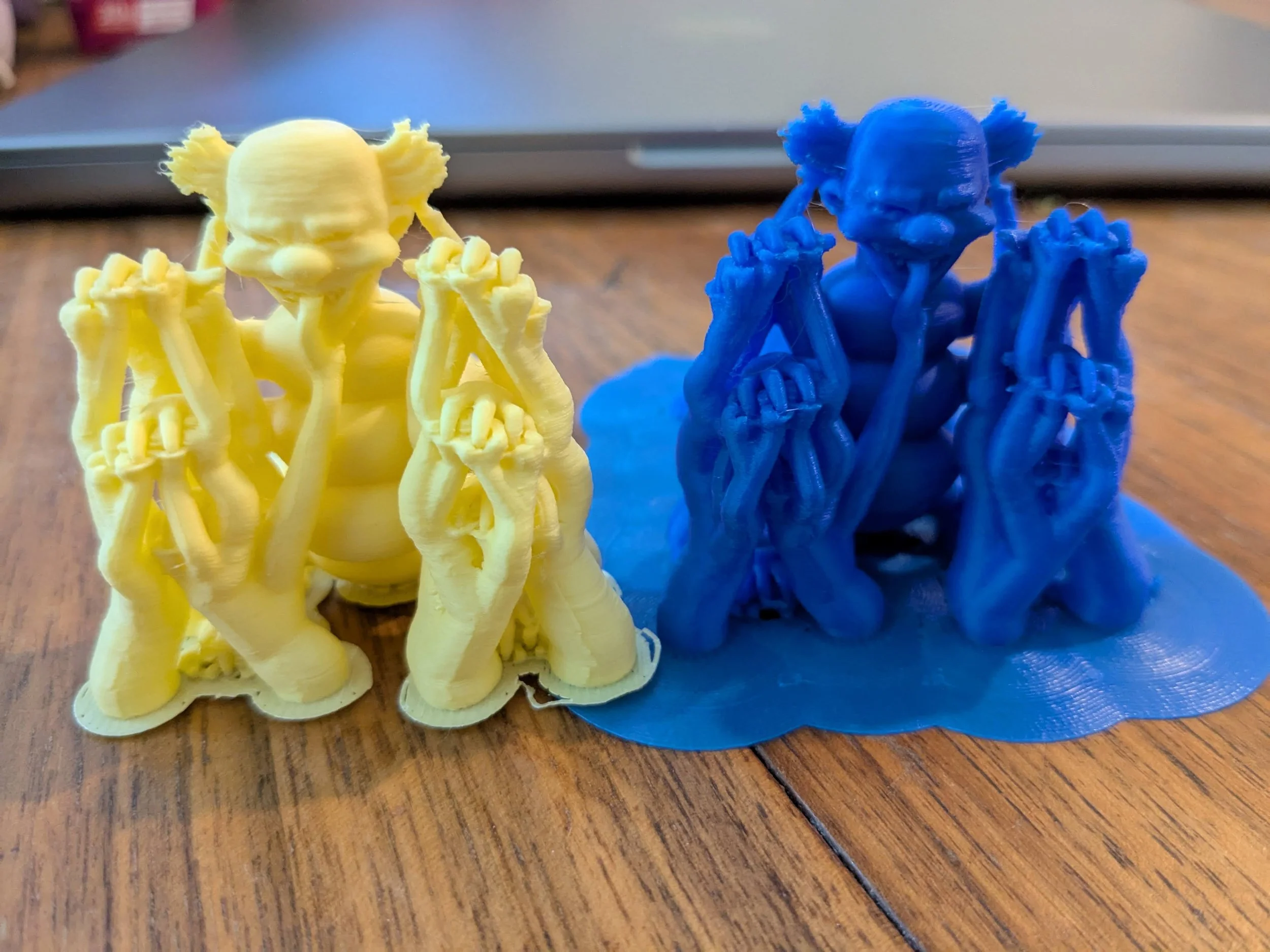 yellow and blue clowns as modeled for A.D. Aro's Clowning Around - without the filament supports removed yet