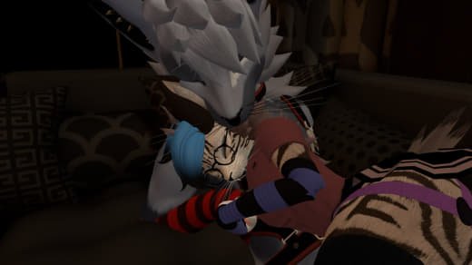 Cartoon characters of a wolf and a tiger lying on a couch, with the wolf's head resting on the tiger's lap.