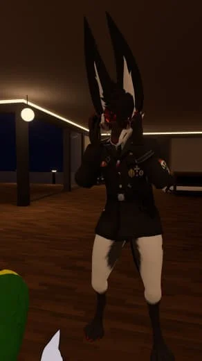A person dressed in a large, anthropomorphic bunny costume with black and white fur, standing indoors on a wooden floor under warm lighting, with a curved ceiling design and a globe-shaped light in the background.