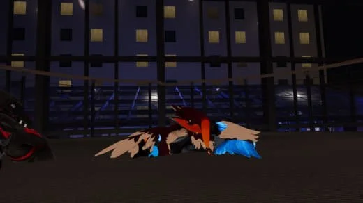 A virtual or animated scene featuring a bird-like creature with red, black, white, and blue feathers, lying on the ground in an urban setting at night with tall buildings and bright windows.
