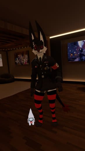 A person dressed in a black military-style uniform with red and black striped tights, a rabbit mask with a skeletal design, and a tail, standing in a dimly lit room with a television mounted on the wall.