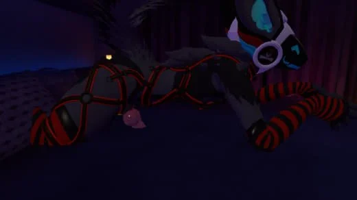 A dark-colored fox wearing goggles, red and black striped leg warmers, and a harness with a leash, lying down on a surface.