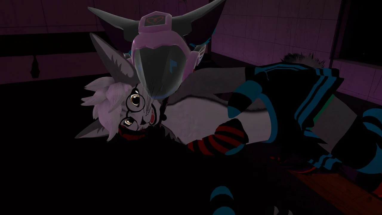 A digitally animated scene of a humanoid wolf and an anthropomorphic fox lying on the floor in a pink-floored room, with the fox on top of the wolf. The wolf has light gray fur, purple hair, and wears glasses, while the fox has a pink and white head 