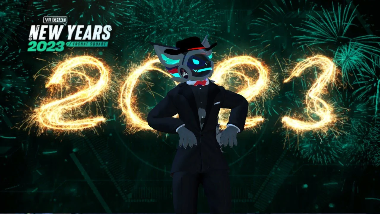 Animated character with a dog-like face wearing a tuxedo and red bowtie, standing with hands on hips, in front of a fireworks display with the numbers 2023 forming in sparks, celebrating New Year's 2023.