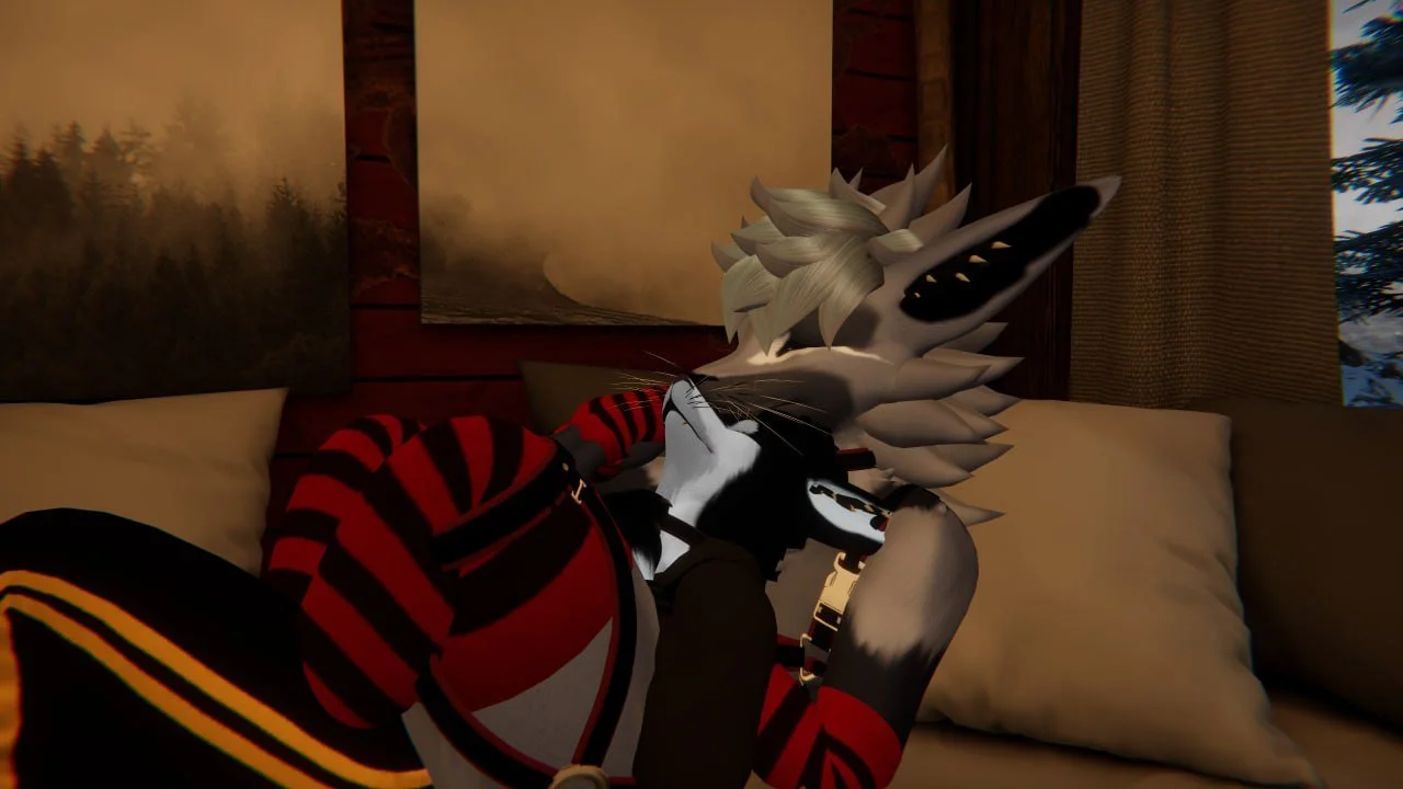 Two anthropomorphic animals, a black and white wolf and a white dragon, sitting on a couch in a cozy room, with the wolf resting its head on the dragon's shoulder.