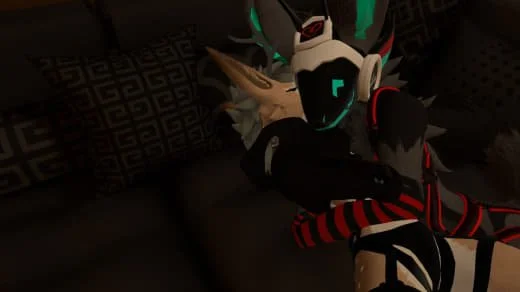 A person watching a cosplay of a character with white, black, and teal armor, and long white hair, sitting on a dark patterned couch.