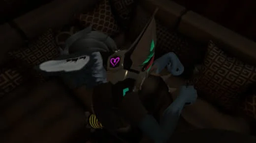 A person wearing a colorful, glowing unicorn mask, lying on a couch with patterned pillows.