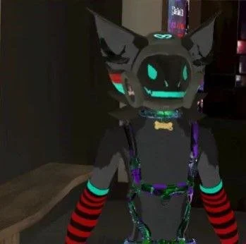 Cosplaying as a cartoon pig with a large head, black ears, and green glowing eyes, wearing a black and purple harness with red and black striped gloves.