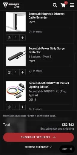 Screenshot of an online shopping cart on a mobile device, showing three electronic items: a Secretlab Magnetic Ethernet Cable Extender, a Secretlab Power Strip Surge Protector, and a Secretlab MAGRGB™ XL Smart Lighting Edition, with prices and total 