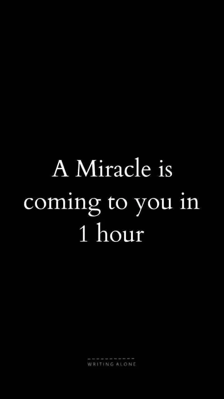 Inspirational quote on black background stating, 'A Miracle is coming to you in 1 hour' by Theresa Ocheje, Writing Alone.