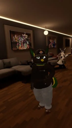 Person dressed in a unicorn costume with a black cat mask, standing in a living room with wall art and a large sectional sofa.