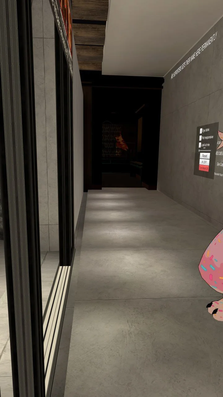 Empty indoor corridor with gray tiled walls and floor, illuminated by overhead lights, with a black elevator door on the left and signage on the right wall, partially showing an animated character with pink and blue sprinkles.