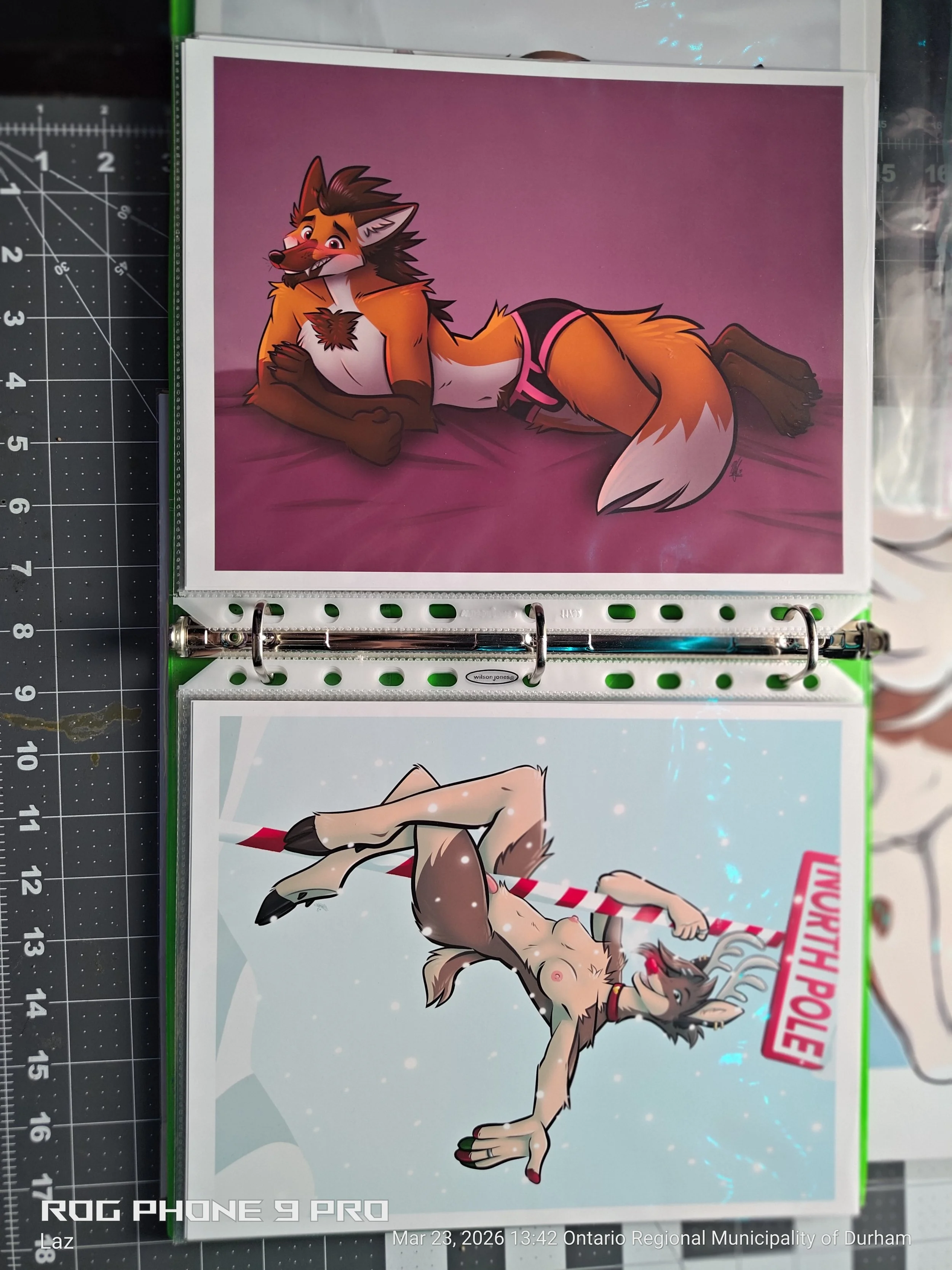 A cartoon illustration of a playful female fox character lying on her side on a purple background. She has orange fur with white and black accents, and is wearing pink underwear. The fox has a surprised or curious expression with wide eyes and a rais