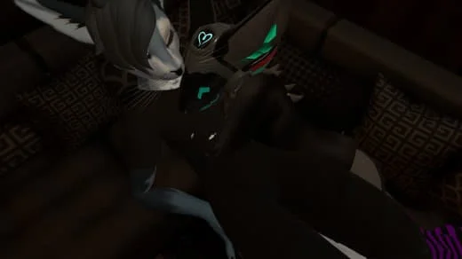 Two people in gaming costumes with neon accents, lying on a couch, facing each other and making peace signs with their hands.