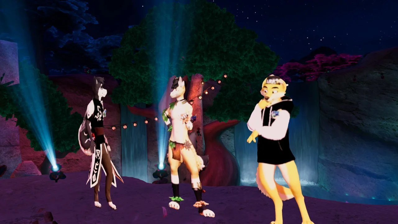 Three animated characters standing outdoors at night with waterfalls and trees in the background, illuminated by colorful stage lights.