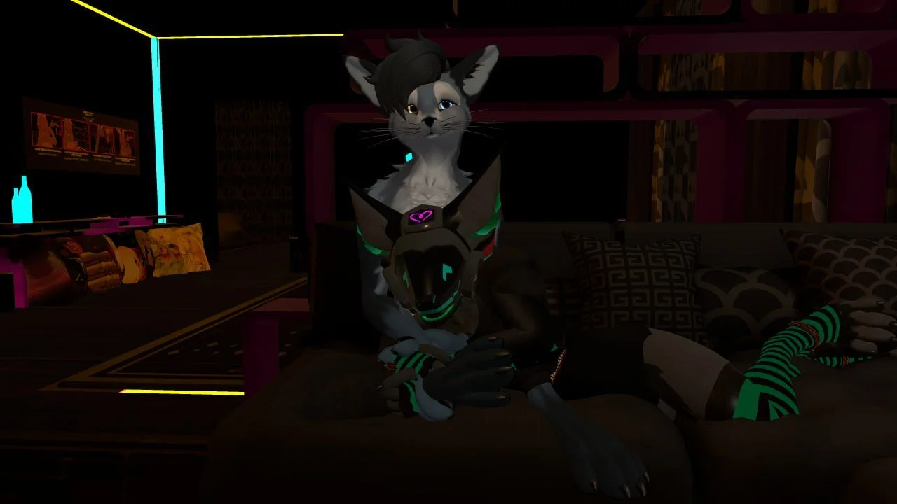 Anthropomorphic feline character with gray fur, black hair, and blue eyes sitting on a couch in a dimly lit room with colorful neon lights and modern decor.