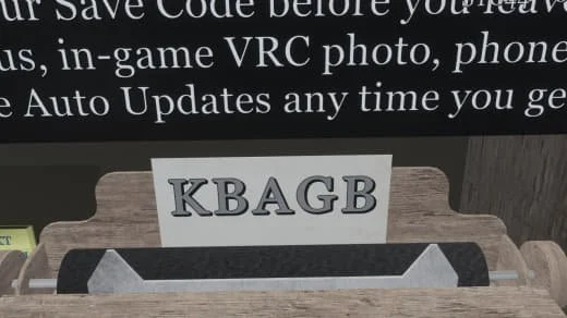 Wooden display stand holding a white card with the letters 'KBAGB' in bold gray font.