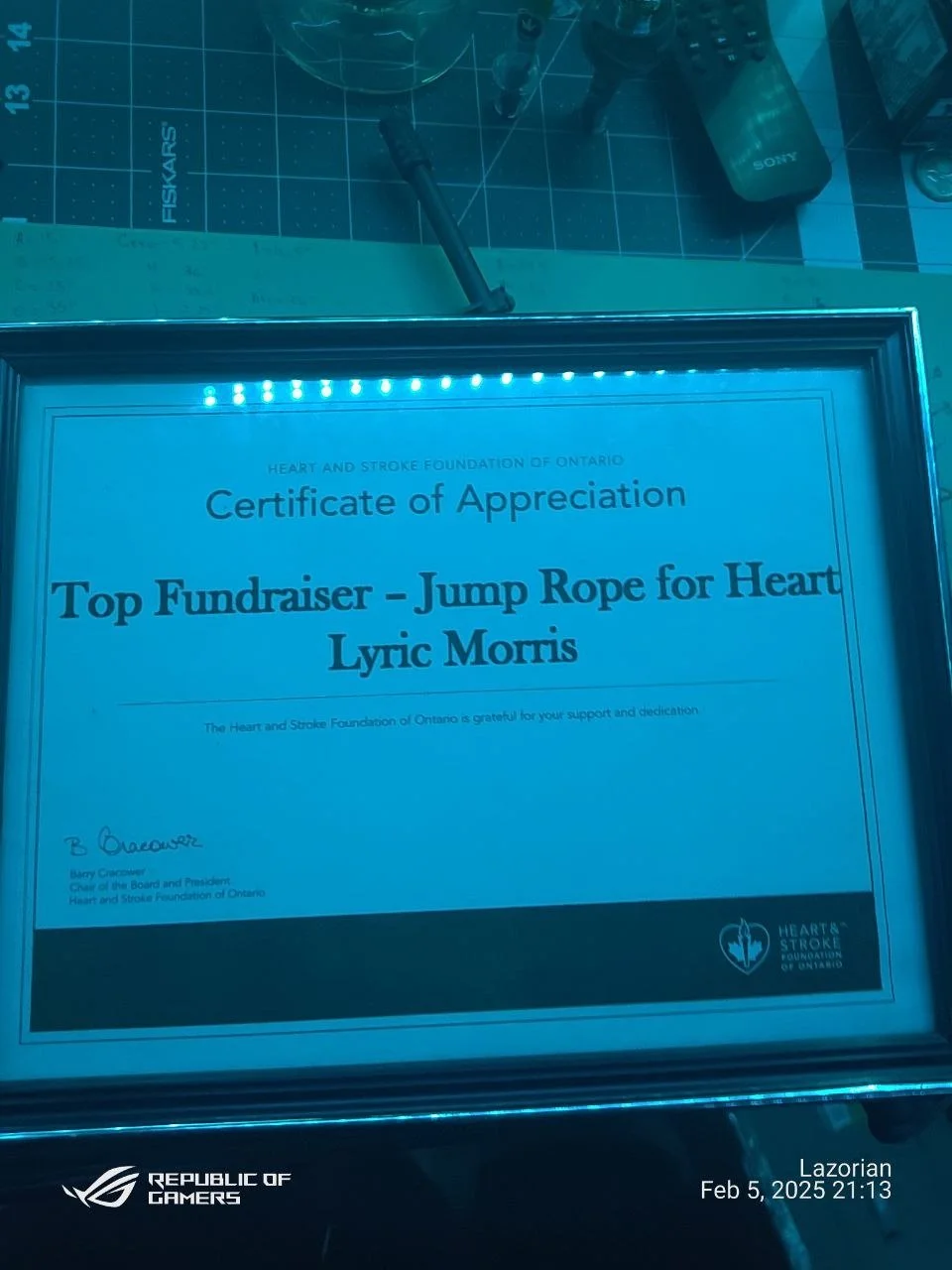 A framed certificate of appreciation from the Heart and Stroke Foundation of Ontario awarded to Lyric Morris for being the top fundraiser for jump rope for heart, signed by Barry Ciaciver.