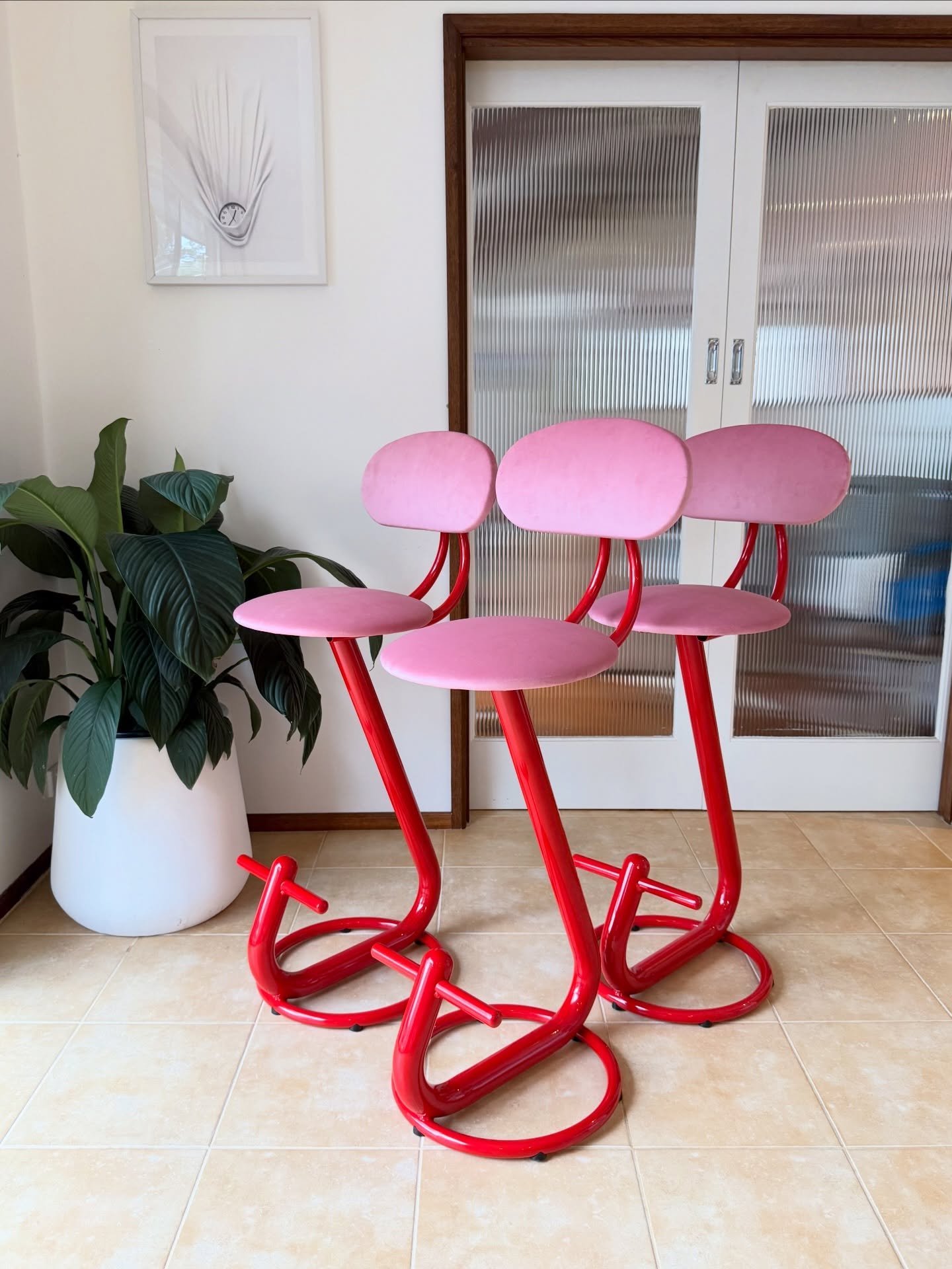 SOLD - 3x Red/Pink funky chunky tubular bar stools. 

Freshly powder coated bright red chunky cantilevering frame with soft pink velvet upholstery. 

Dimensions: 400w x 540d x 1120h 
790h seat height. 

*these are vintage stools brought back to life 