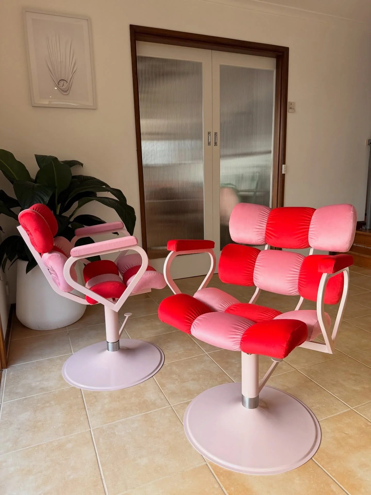 SOLD - 2x Pink &amp; Red checkered bubble chairs with soft velvet upholstery. Freshly powder coated in a dusty pink frame and tulip swivel base with foot operated gas lift. 

Dimensions: 630w x 640d x 850h. 
Seat height: 490-630h.

*These chairs have