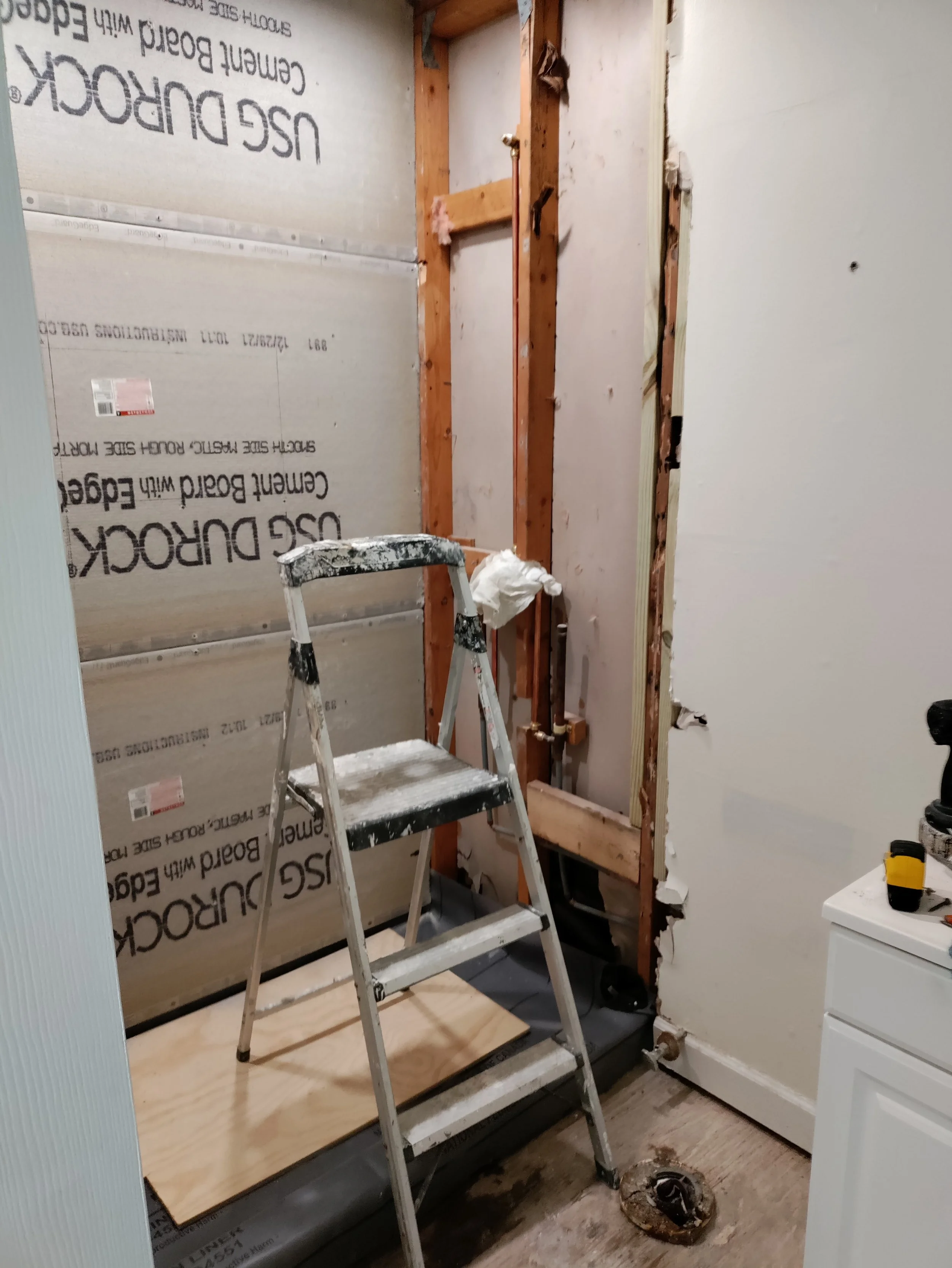 Cement board installation for walk-in shower renovation