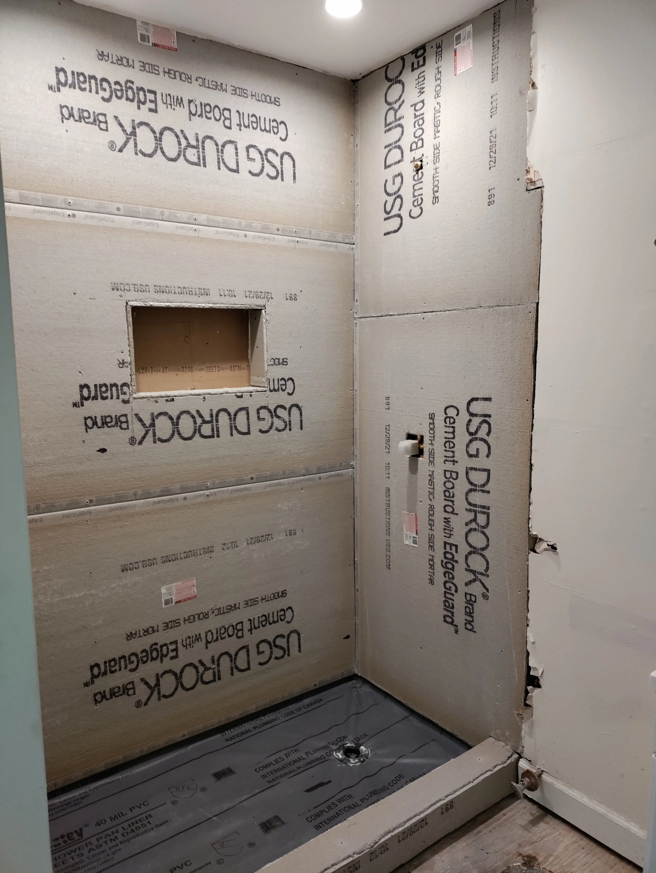 Cement board installation for walk-in shower renovation