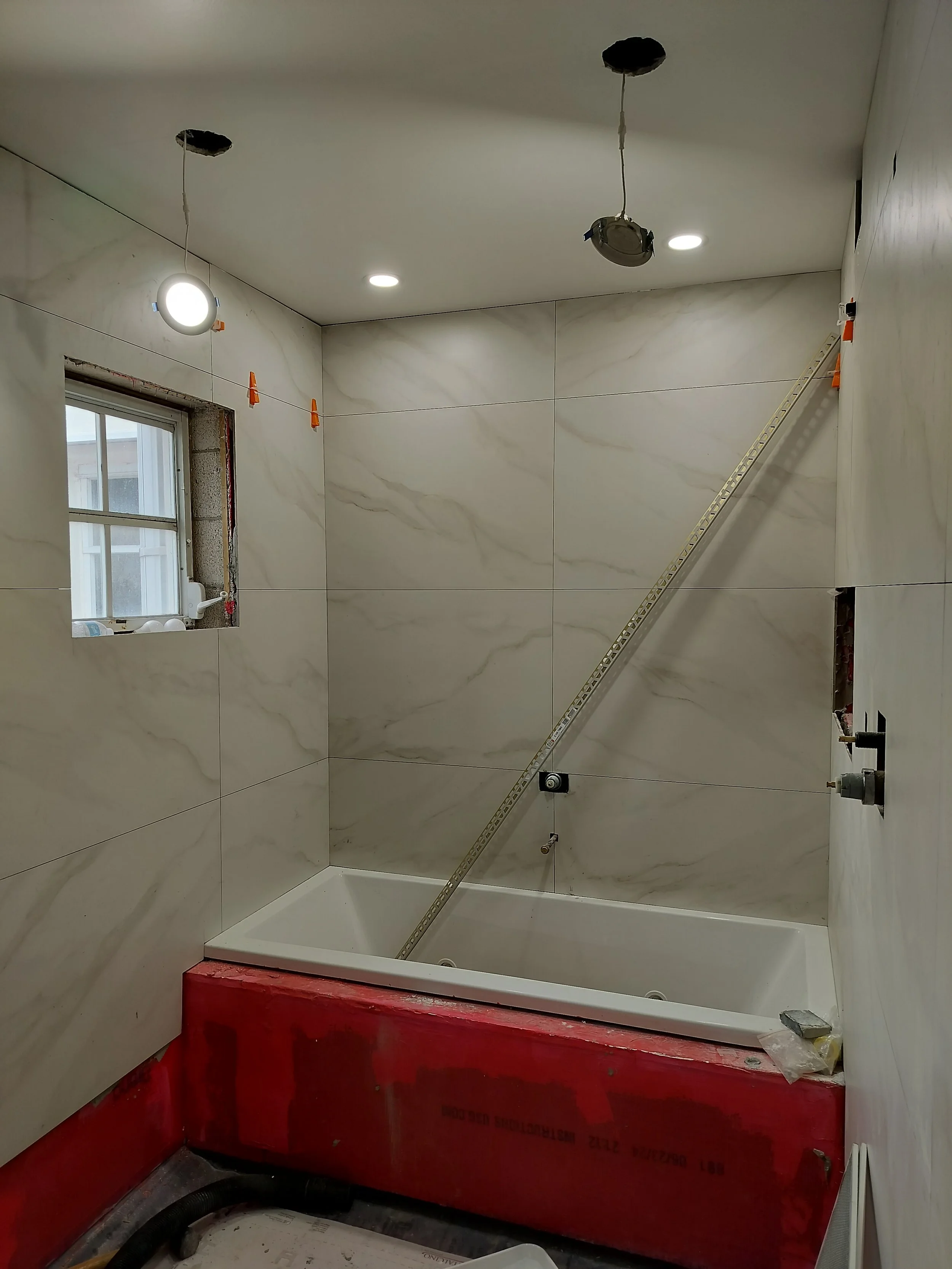 Master Bathroom Remodel in Miami Beach tile installation