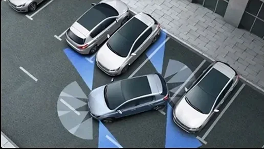 Four cars parked in designated parking spots, with some parking spots marked for handicapped accessibility.