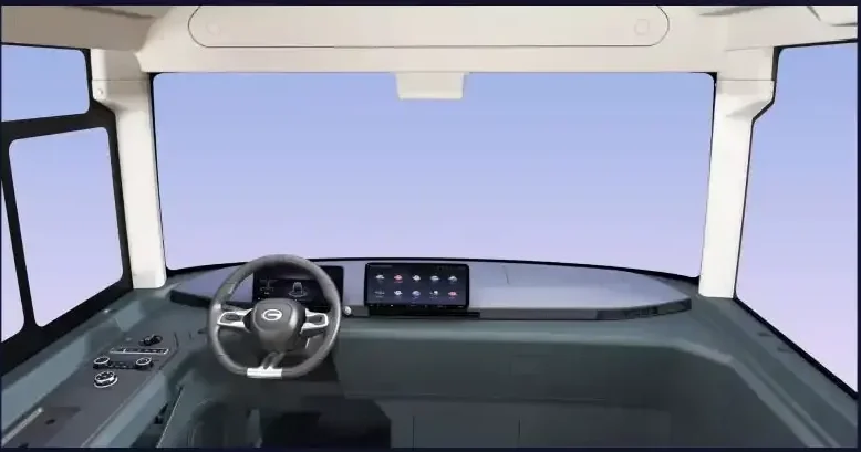 Interior of a modern transportation vehicle cockpit with a steering wheel, digital display, and large windows.