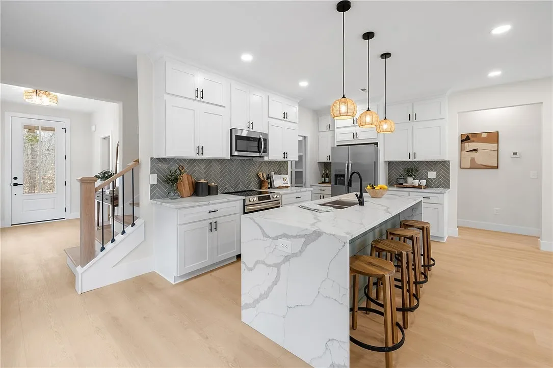 Modern kitchen professionally staged by VIBE Designs in Greenville, SC.
