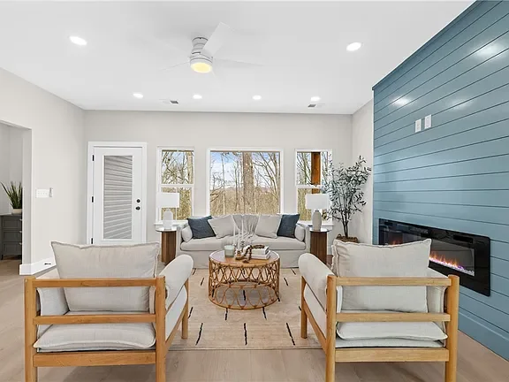 Modern living room professionally staged by VIBE Designs in Greenville, SC.