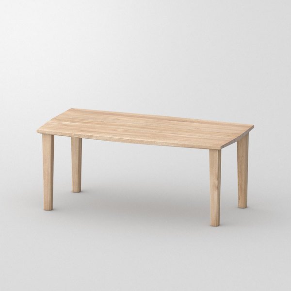 A simple wooden table with four legs against a plain background.