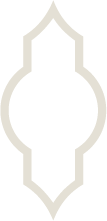 Outline of a decorative, ornate frame or label shape.