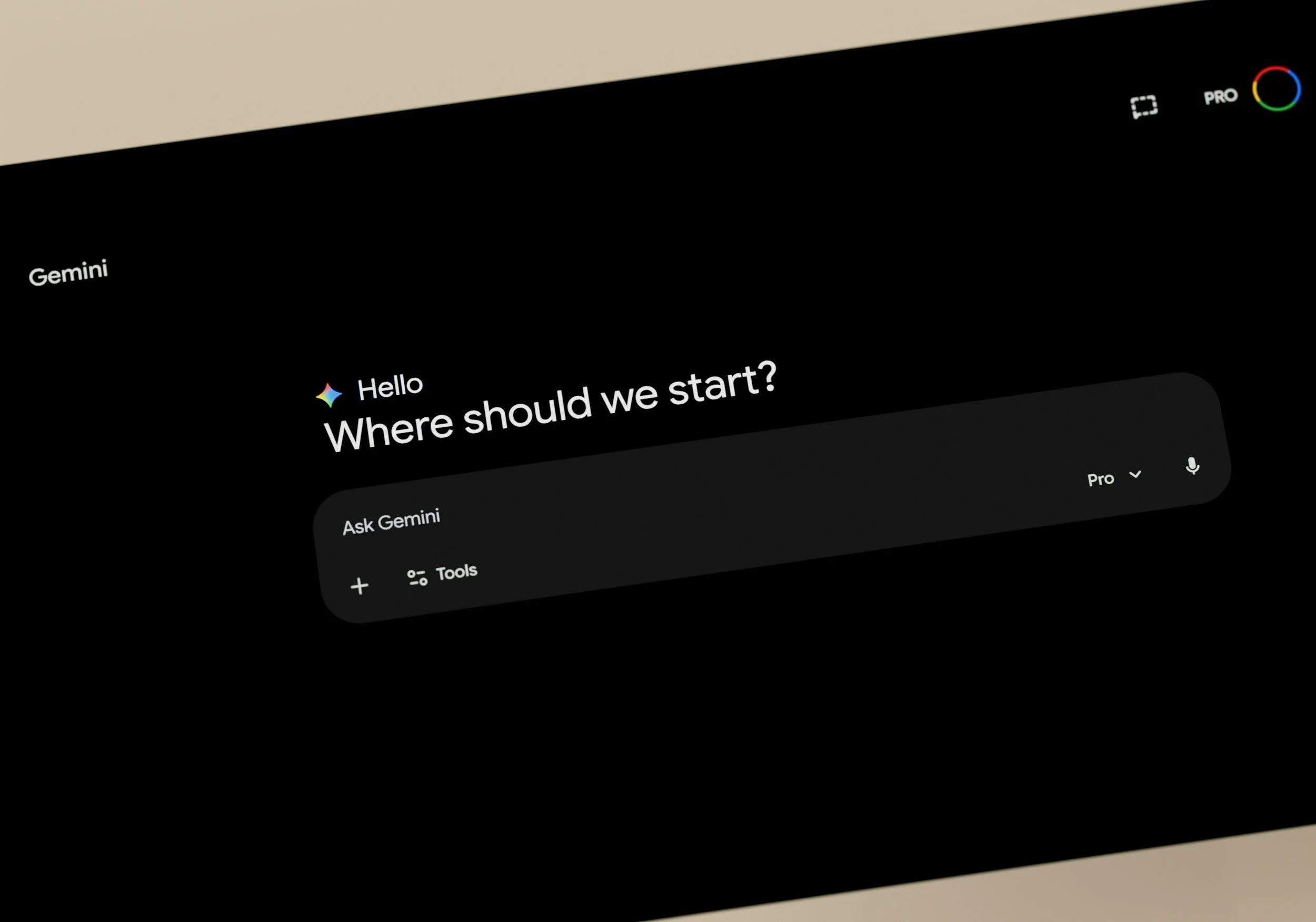 Screenshot of a digital assistant interface asking, 'Where should we start?'. The interface includes a search bar labeled 'Ask Gemini,' options for tools and a microphone icon, and a colorful ring icon in the top right corner.