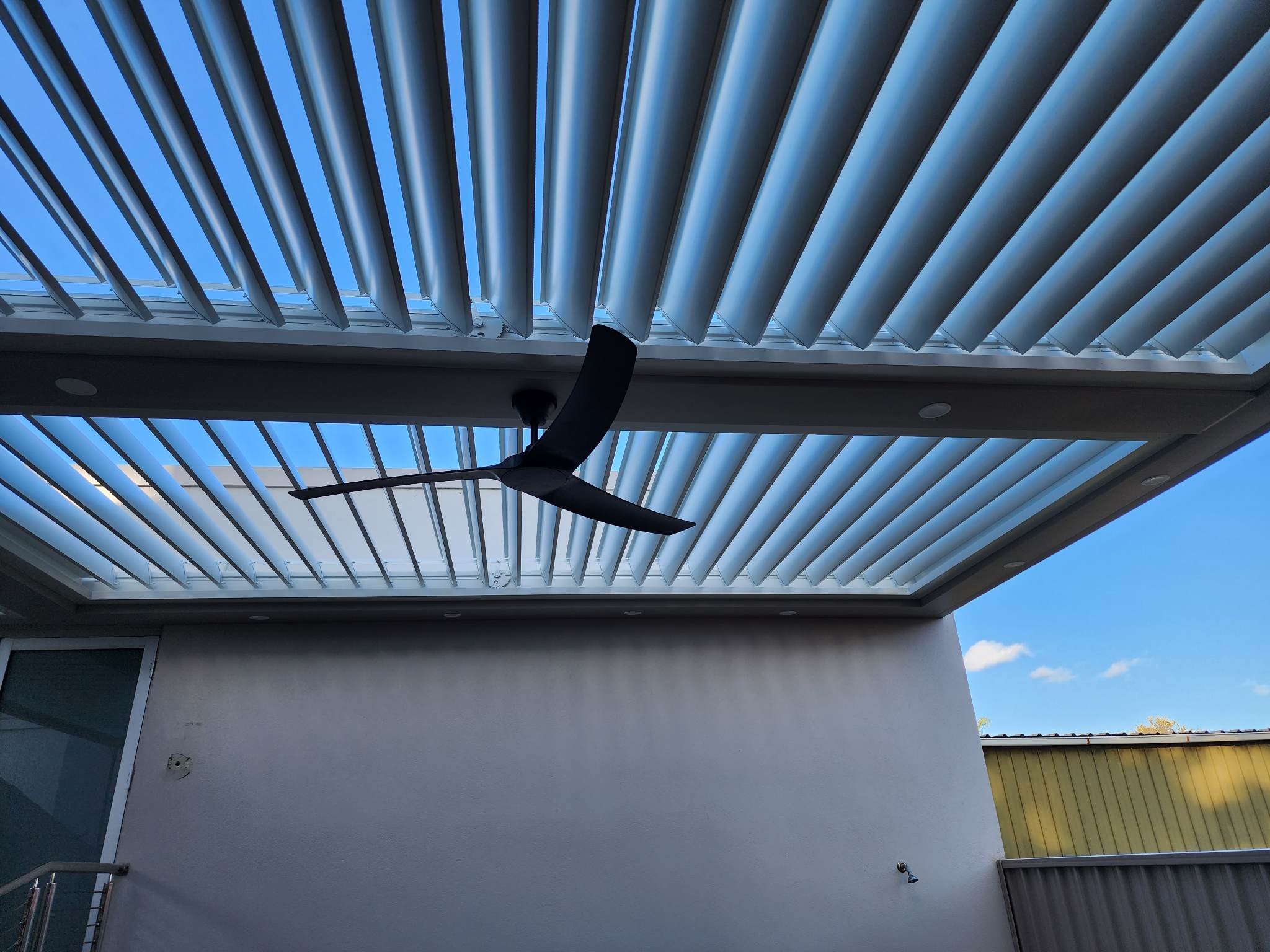 louvre roof and a fan in the top