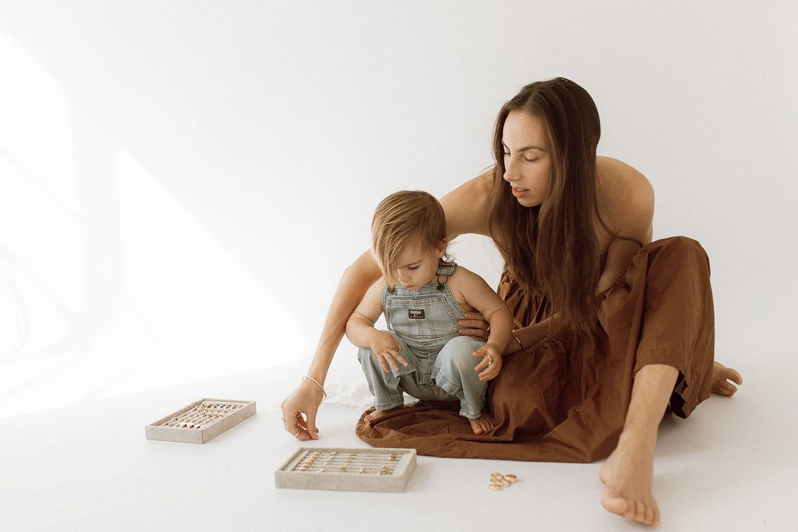 Mother, Tania Gnecchi and her daughter sitting together, matrescence podcast about motherhood identity