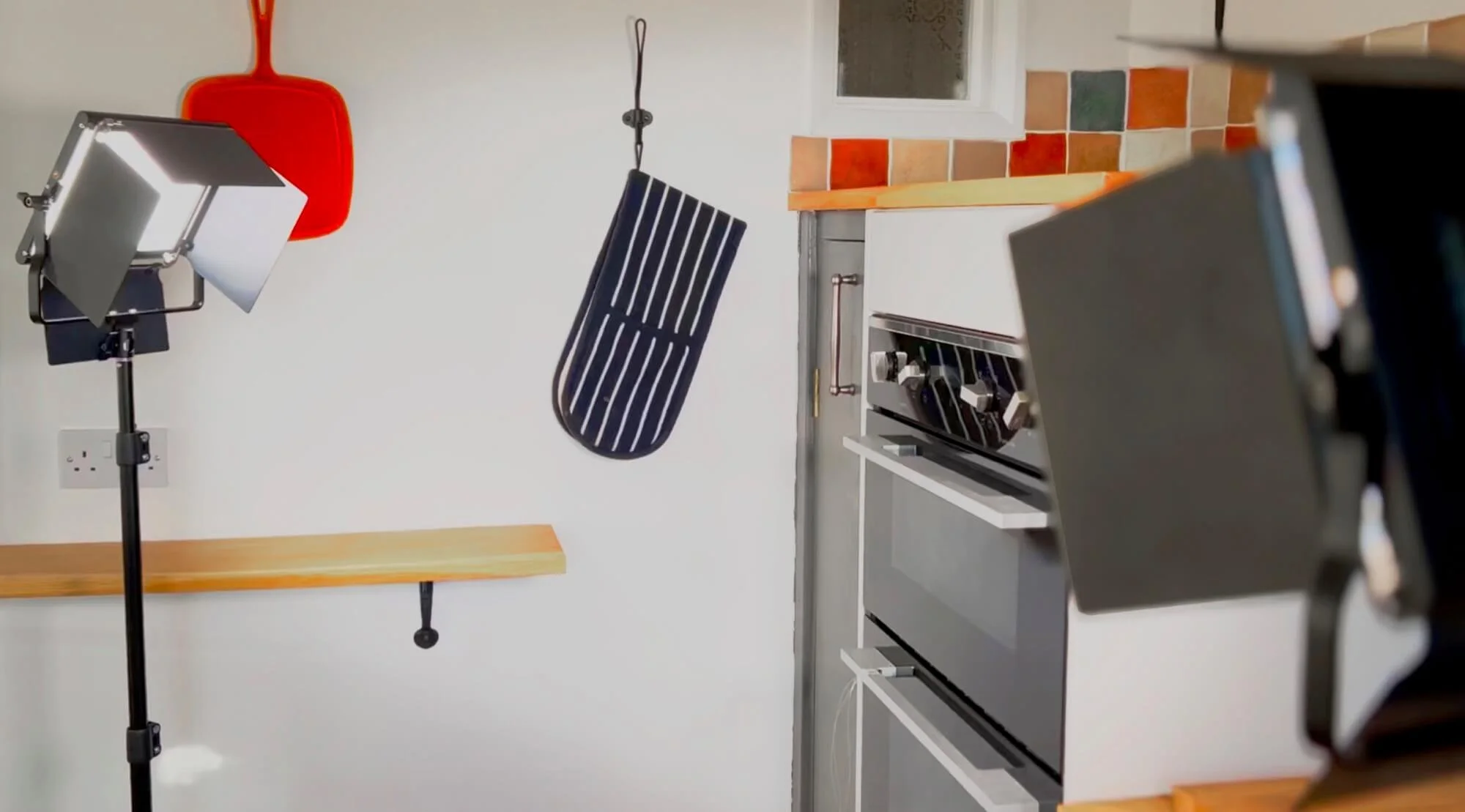 Indoor kitchen scene with a studio light