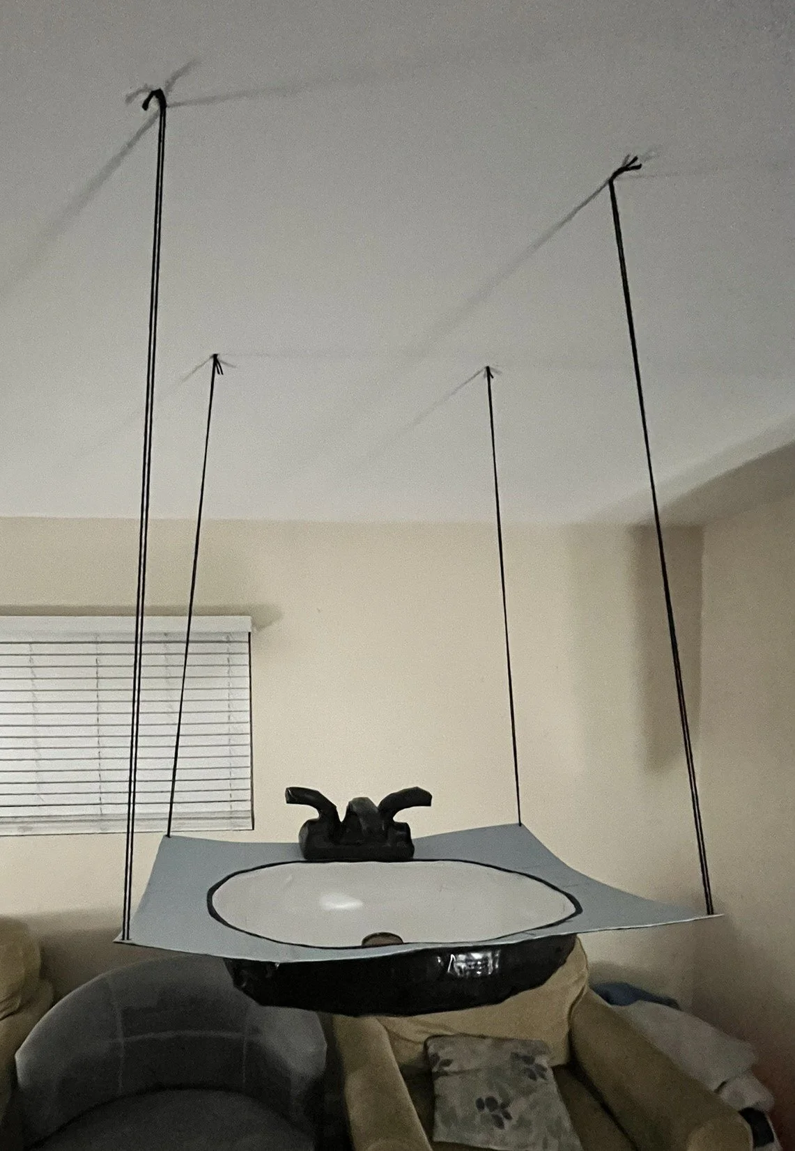 "Sink", duct tape, packing supplies, construction paper & hot glue