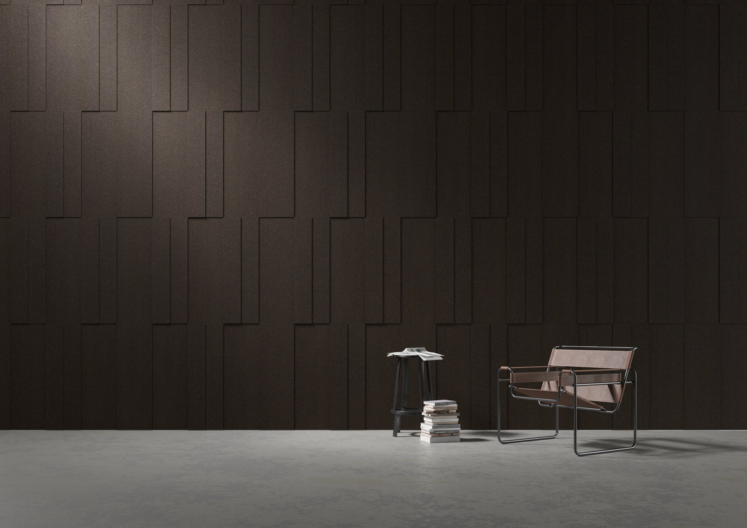 Modern interior with dark wooden wall, small black table holding an open book, a few stacked books, and a brown chair with metal frame