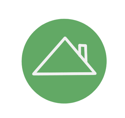 Green circle with white outline of a house with a peaked roof and a chimney.