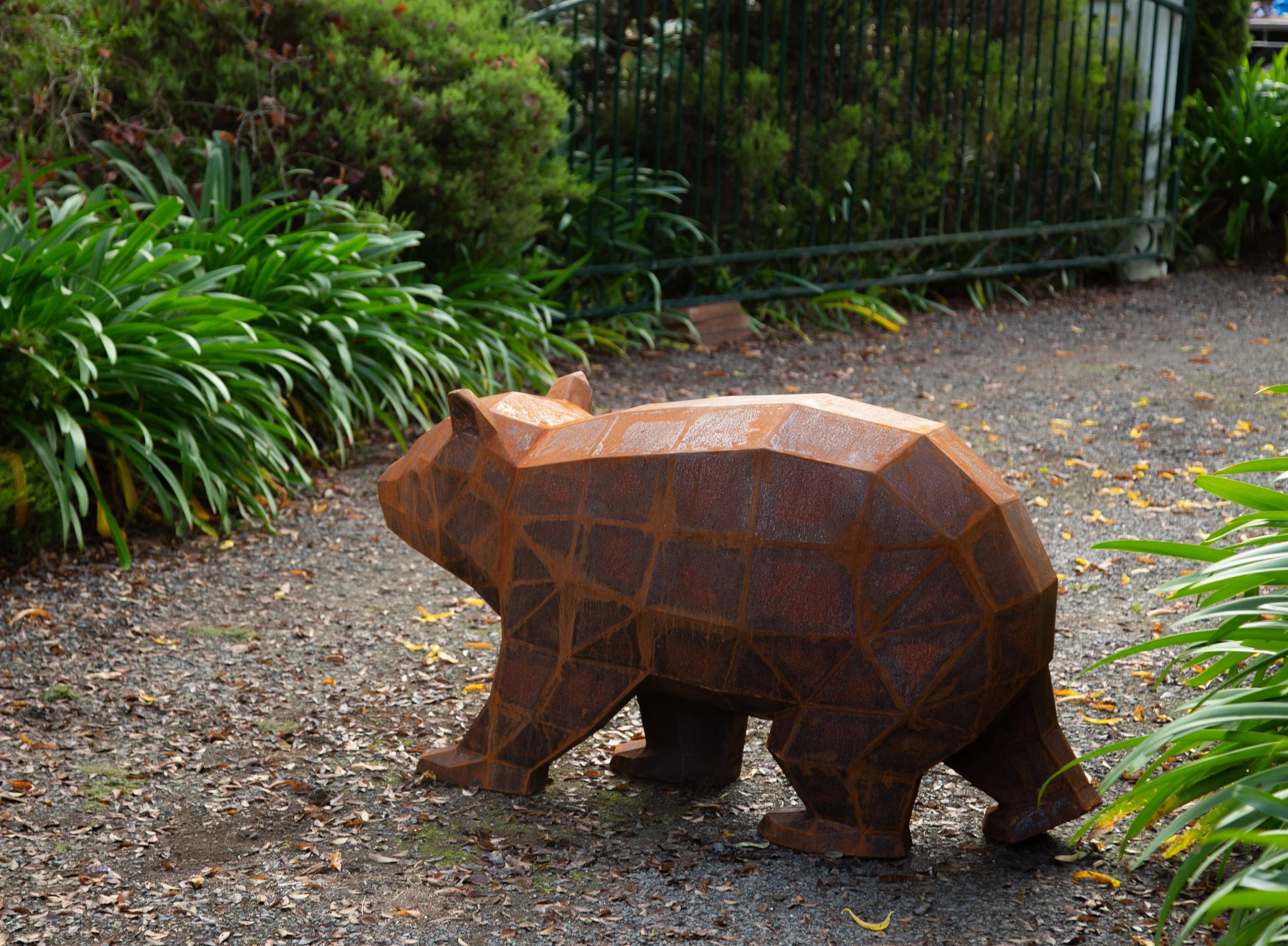 Low Poly corten steel walking wombat sculpture