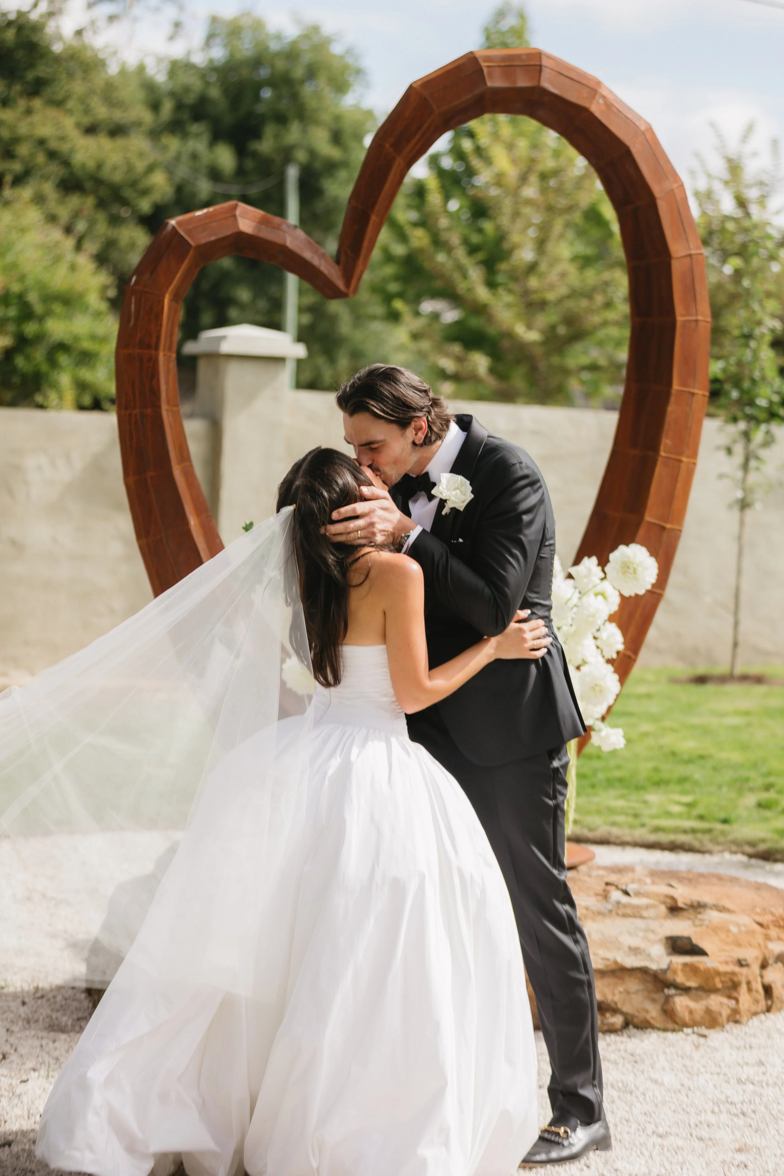 low poly corten steel heart wedding backdrop
