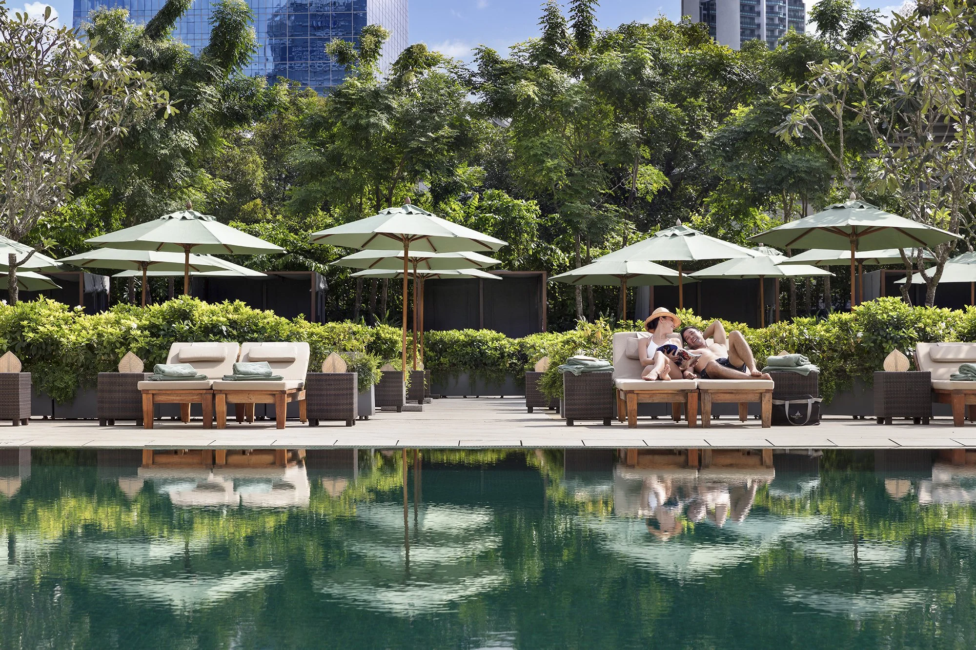 The Sukhothai Bangkok Swimming Pool Angle 4 w Models.jpg