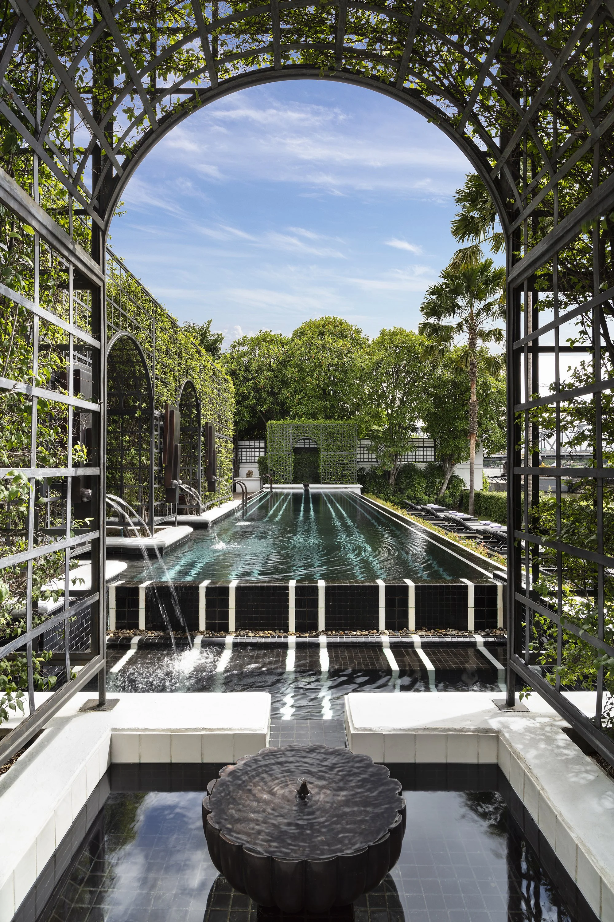 Swimming pool thorugh Arch— The Siam Hotel Bangkok — Ellsworth/Lim